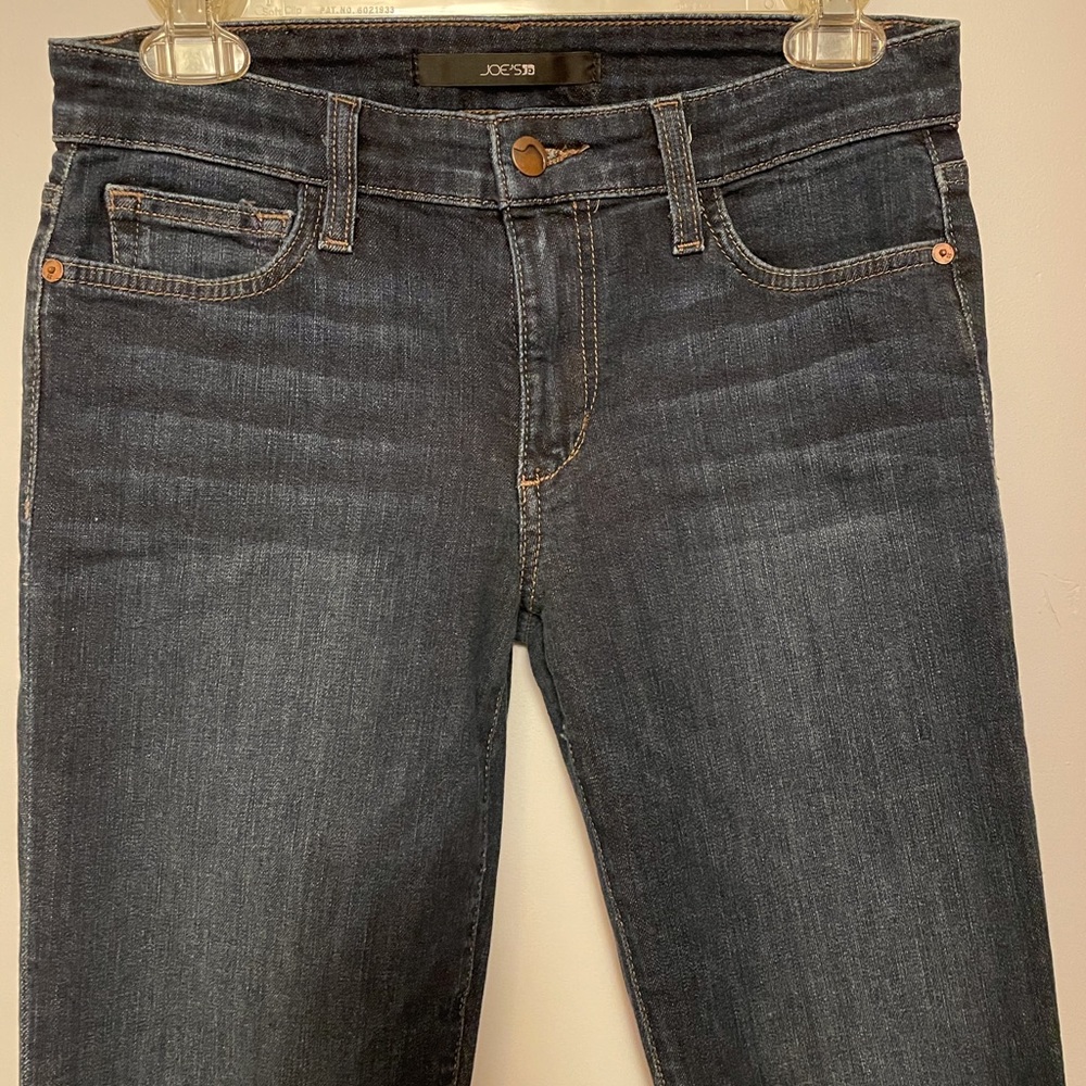 Joe’s Jeans in dark wash color.